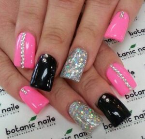 pink and black stone nail art
