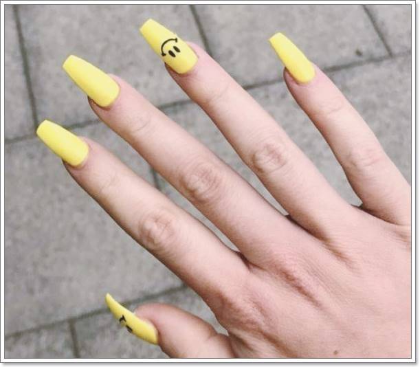 yellow smile face nail art design ideas